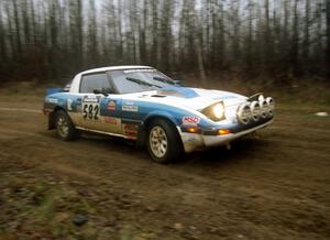 Doug Dill / Tyler Dill at speed on East Steamboat Rd. in their Mazda RX-7.