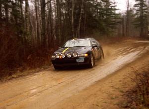 Brian Rehbein / Crystal Johnston at speed on East Steamboat Rd. in their Plymouth Laser.