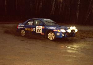 Mark Utecht / Jeff Secor slide their Subaru WRX through the crossroads hairpin before heading uphill.