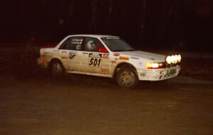 Todd Jarvey / Rich Faber head uphill at the crossroads hairpin spectator location in their Mitsubishi Galant VR4.