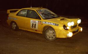 The Doug Havir / Scott Putnam Subaru WRX STi heads uphill at the crossroads hairpin spectator location.