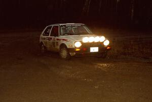 Bob Nielsen / Al Kintigh head uphill at the crossroads hairpin spectator location in their VW GTI.