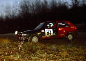 The J.B. Niday / Jeff Burmeister VW GTI drifts at the crossroads spectator hairpin.