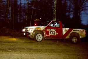 Jim Cox / Kaari Cox head uphill at the crossroads spectator location in their Chevy S-10.