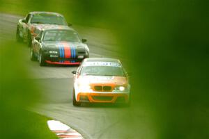 Chris Davis' SPU BMW 330, Samantha Silver's Spec Miata Mazda Miata and Chris Craft's Spec Miata Mazda Miata