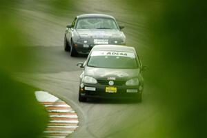 Tom Daly's T4 VW Rabbit and Aaron Jongbloedt's Spec Miata Mazda Miata