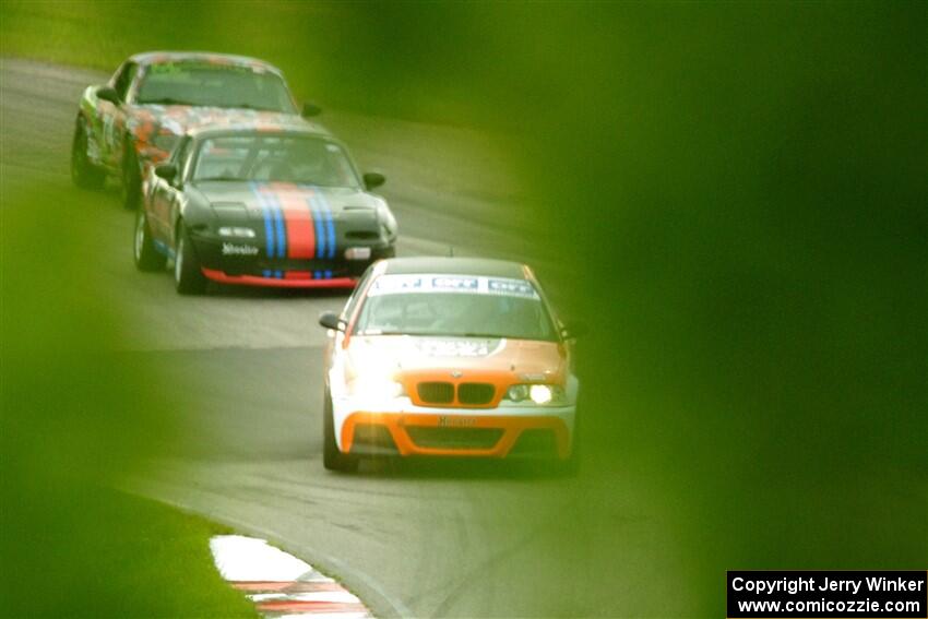 Chris Davis' SPU BMW 330, Samantha Silver's Spec Miata Mazda Miata and Chris Craft's Spec Miata Mazda Miata