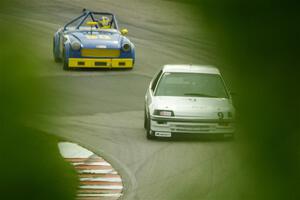 Jack Sparks' STL Honda Civic and Bob Stream's H Production MG Midget