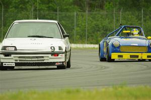 Jack Sparks' STL Honda Civic and Bob Stream's H Production MG Midget