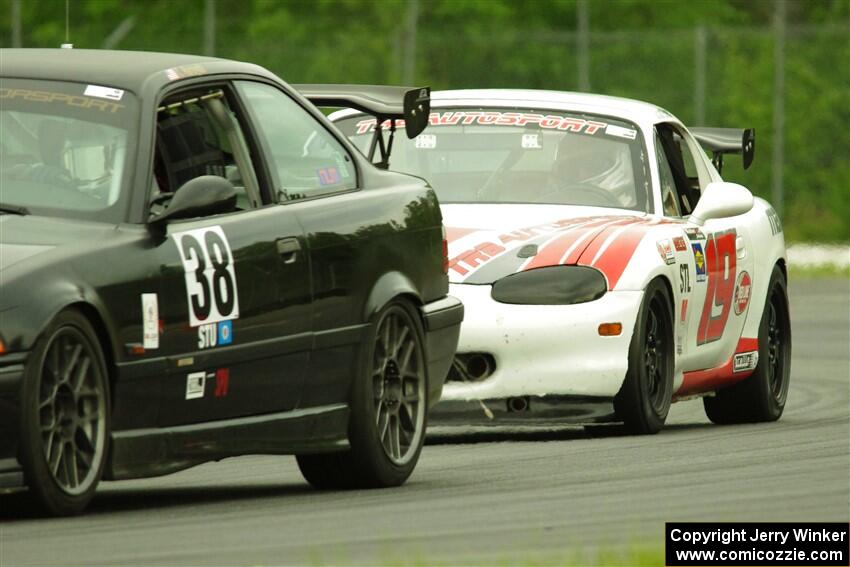C.J. Harayda's SPU BMW M3 and Justin Elder's STL Mazda Miata