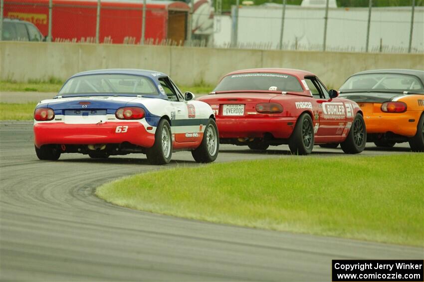 Cam Ebben's, Andrew Jenkins' and Bill Collins' Spec Miata Mazda Miatas