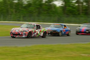 Chris Craft's, Gordon Kuhnley's and Samantha Silver's Spec Miata Mazda Miatas