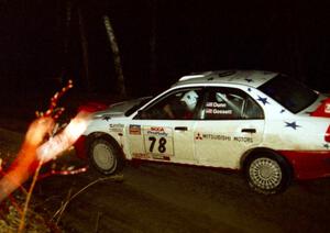Paul Dunn / Pete Gossett won the event in their Mitsubishi Lancer Evo IV seen crossing the flying finish of the last stage.
