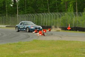 Roger Knuteson's T4 BMW Z4 goes off at turn 8.