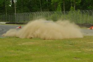 Roger Knuteson's T4 BMW Z4 goes off at turn 8.
