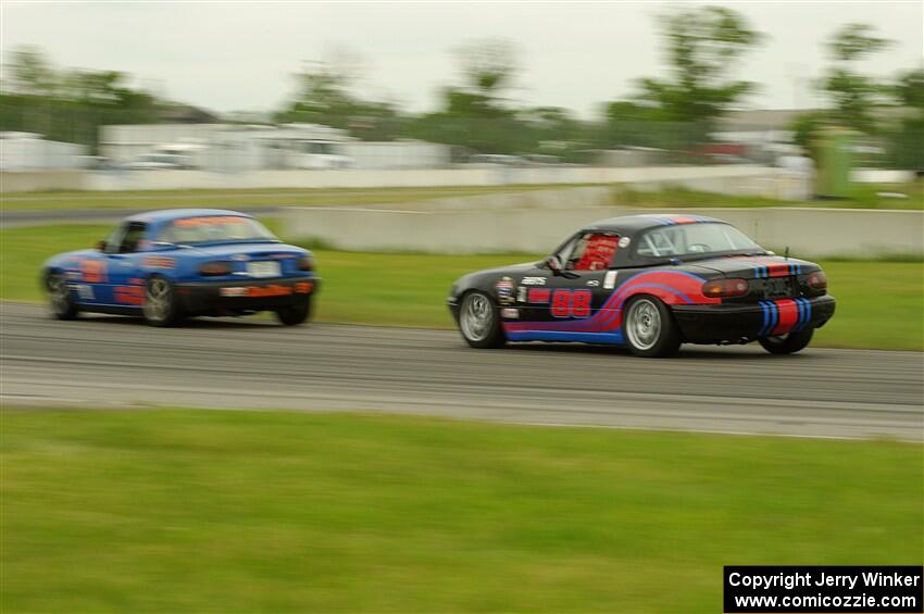 Gordon Kuhnley's and Samantha Silver's Spec Miata Mazda Miatas