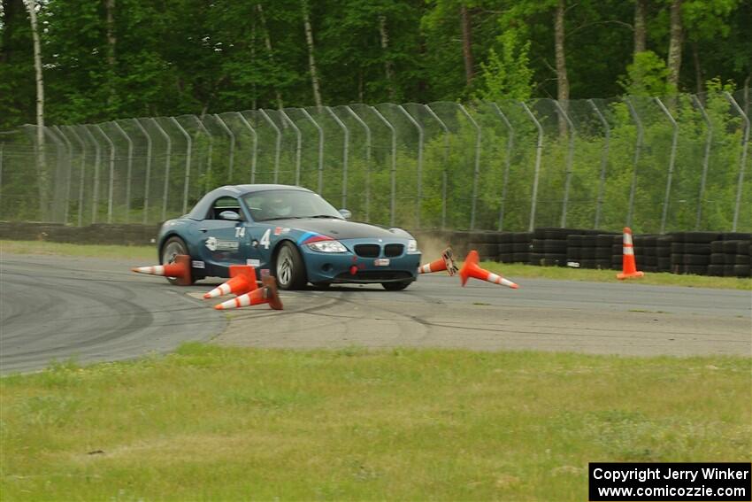 Roger Knuteson's T4 BMW Z4 goes off at turn 8.