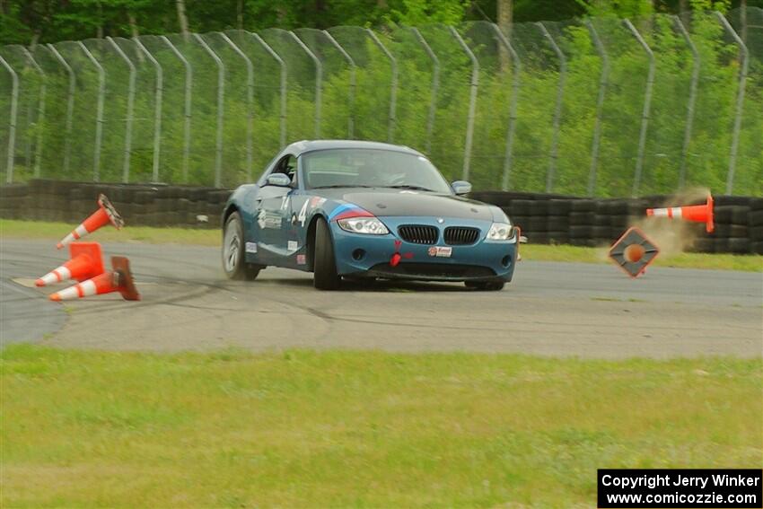 Roger Knuteson's T4 BMW Z4 goes off at turn 8.