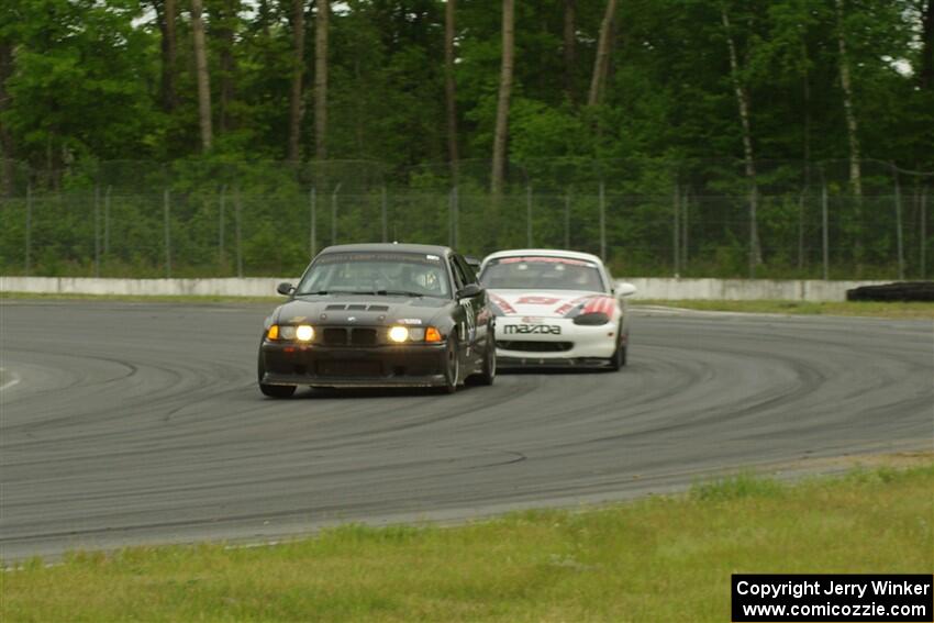 C.J. Harayda's SPU BMW M3 and Justin Elder's STL Mazda Miata
