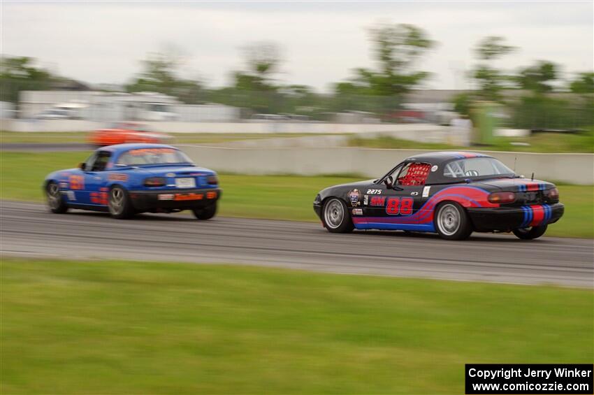 Gordon Kuhnley's and Samantha Silver's Spec Miata Mazda Miatas