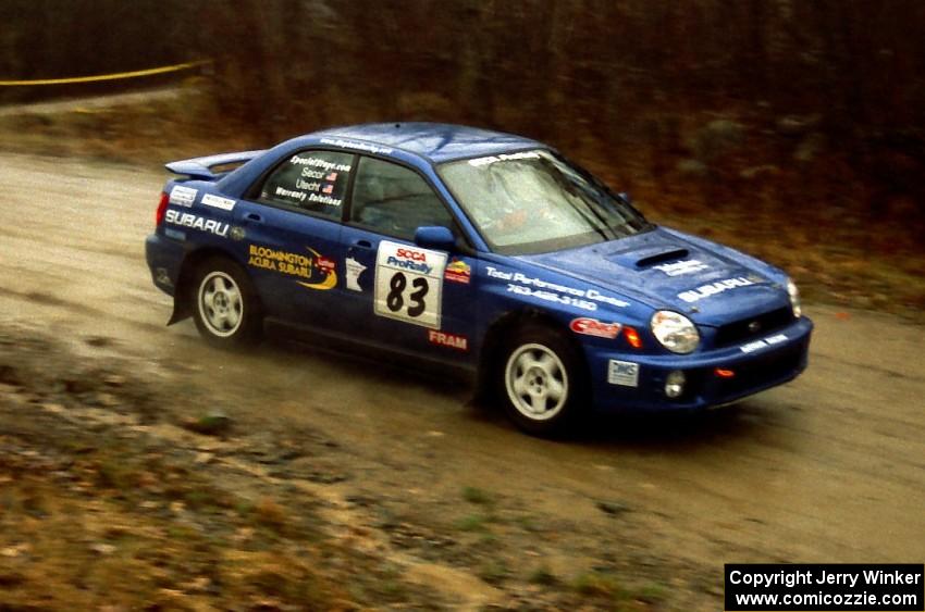 Mark Utecht / Jeff Secor at speed at the crossroads in their Subaru WRX.