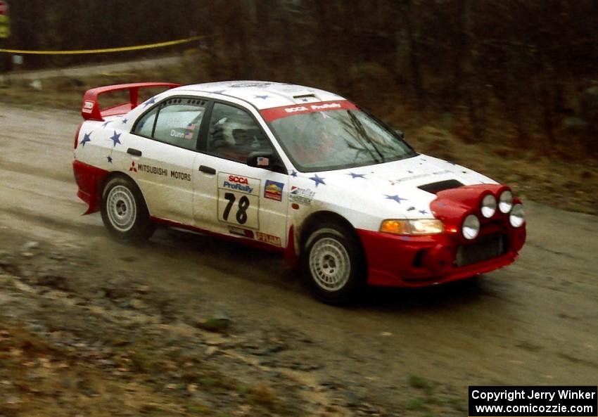 The Paul Dunn / Pete Gossett Mitsubishi Lancer Evo IV comes through the crossroads at speed.