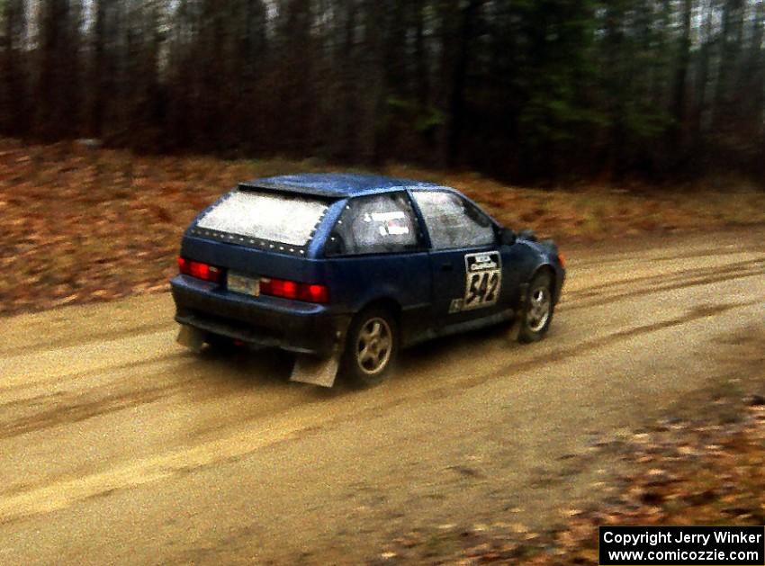 Dan Moore / John Hopponen at speed on a straight on East Steamboat Rd. in their Suzuki Swift GTi.