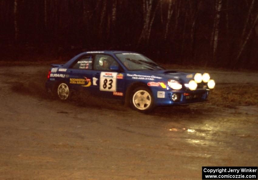 Mark Utecht / Jeff Secor slide their Subaru WRX through the crossroads hairpin before heading uphill.