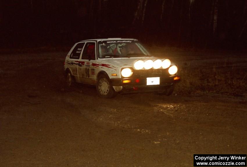 Bob Nielsen / Al Kintigh head uphill at the crossroads hairpin spectator location in their VW GTI.