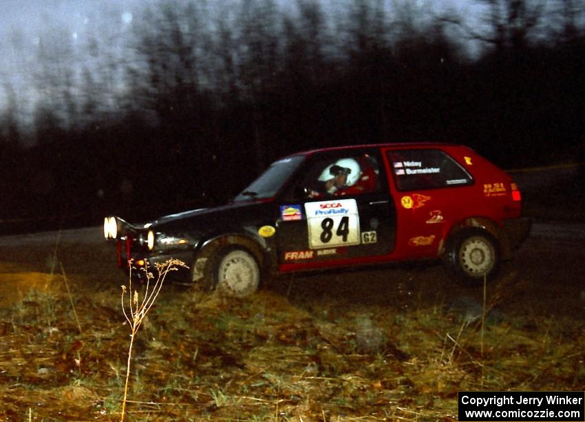 The J.B. Niday / Jeff Burmeister VW GTI drifts at the crossroads spectator hairpin.