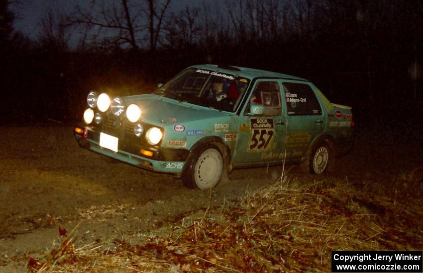 Damien Crane / Larry Warrington head uphill in their VW Jetta at the crossroads spectator hairpin.