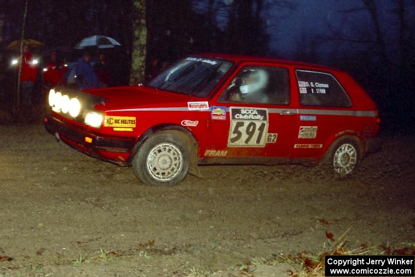 Dave S. Cizmas / Dave L. Cizmas VW GTI heads uphill at the crossroads spectator hairpin.