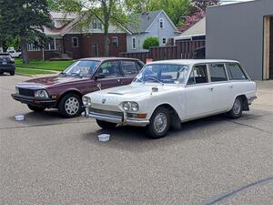 Triumph 200 Estate Wagon (foreground) and Peugeot 505