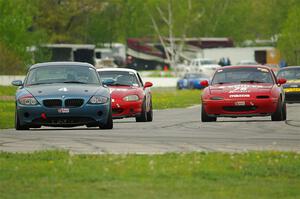 Roger Knuteson's T4 BMW Z4, Andrew Jenkins' Spec Miata Mazda Miata and Mitch Welker's Spec Miata Mazda Miata
