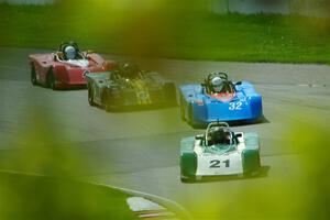 Steve DeRoche's, Maksim Belov's, Rob Wilke's Spec Racer Ford 3s and John Janssen's Spec Racer Ford