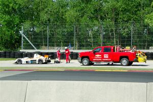 The safety team comes for Eric Wagner's Radical SR3 RSX 1340 at turn 6.