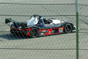 Huw Leahy's Radical SR3 RSX 1340 spins at turn 12.