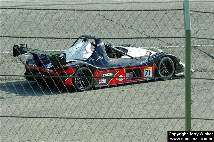 Huw Leahy's Radical SR3 RSX 1340 spins at turn 12.