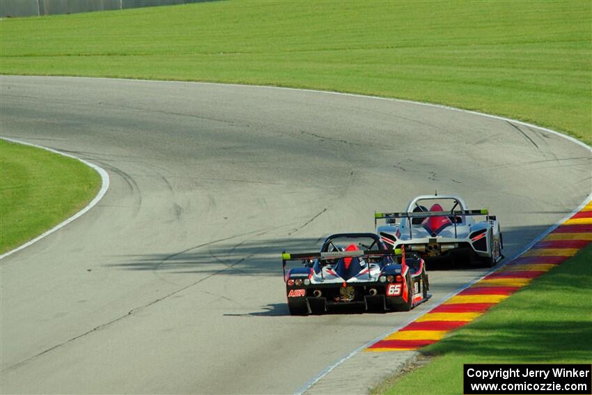 Jim Booth's Radical SR8 leads Dave Tweedlie's Radical SR8 RX through turn 13.