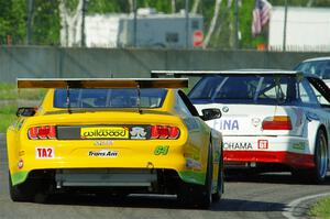 Matt Gray's GT-2 Ford Mustang chases Mike Wagner's ITE-1 BMW M3