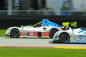 Judd Miller's Radical SR10 passes Louis Schriber III's Radical SR10