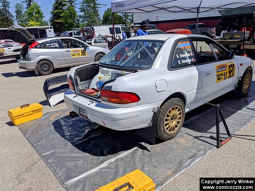 Richard Donovan / Greg Donovan Subaru Impreza and Srikanth Nayini / Boyd Smith Ford Focus SVT before the start of the event.