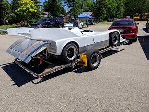 A Porsche 917/10K replicar shows up  before the start of the event.
