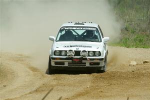 Adam VanDamme / Andrew Herron BMW 325i on SS1, J5 North.