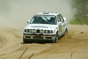 Adam VanDamme / Andrew Herron BMW 325i on SS1, J5 North.