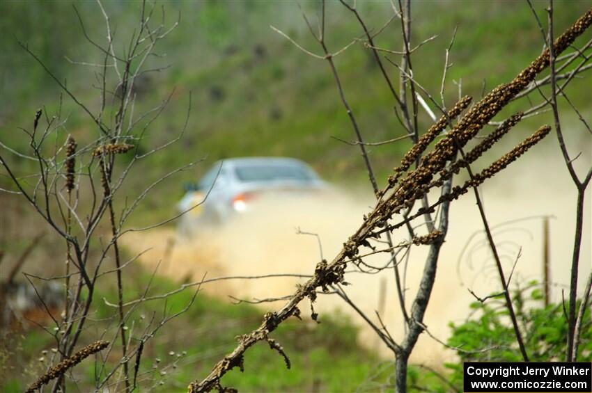 Derek Denti / Shanti Witt Acura RSX on SS1, J5 North.