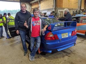 Dmitri Kishkarev / Keegan Helwig Mitsubishi Lancer Evo IV before the event. Dmitri is standing next to Niels Kroeze.