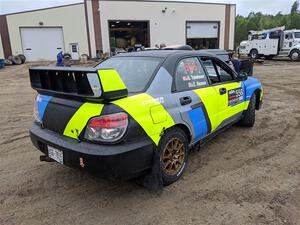 Colin Gleason / Quinn Trumbower Subaru Impreza 2.5RS in the line for tech inspection.