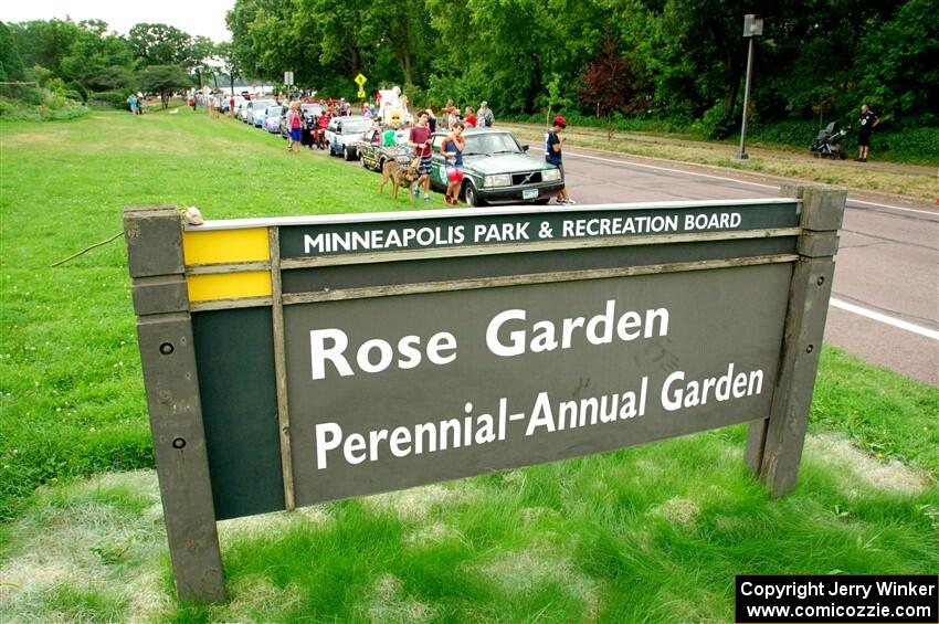 Cars on display near the Rose Garden at Lake Harriet.