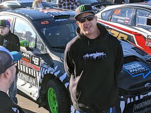 Ken Block in front of his Subaru WRX STi at parc expose.